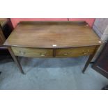 An Edward VII mahogany bow front two drawer side table, 82cms h, 122cms w, 57cms d