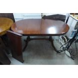 A teak chest of drawers, a/f and a mahogany dining table