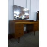 A teak dressing table