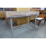 A Danish style limed mahogany two drawer console table