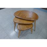 An Ercol Blonde elm and beech pebble shaped nest of tables