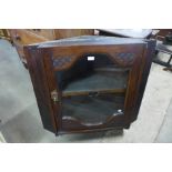 An Edward VII mahogany hanging corner cabinet