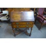 A Queen Anne style walnut bureau de dame, 100cms h, 71cms w, 43cms d