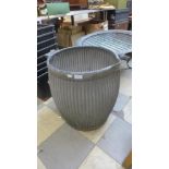 A galvanised dolly tub