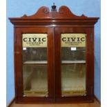 A Victorian mahogany counter top shop cabinet, bearing Civic Company Limited inscription to doors,