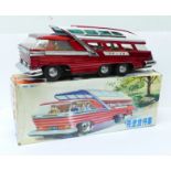 A Chinese battery operated tin-plate Mystery Action Bus, 28cm, boxed