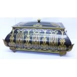 A painted metal casket