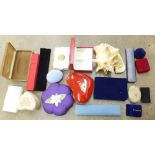 A collection of jewellery boxes and a sea shell