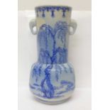 A 19th Century Chinese blue and white vase with six character mark to the base, 21cm