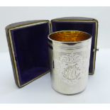 A white metal goblet with monogram and gilt interior, with case, marked 750H, 136g