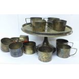 A Geo. Abrahamson Newman Galleries set of twelve silver plated cup holders and stand