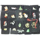 Fifty Christmas themed brooches with pouches