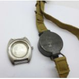 A military compass and a wristwatch case