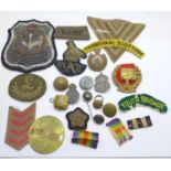 Assorted military badges, etc., including a silver ARP badge, a badge marked D.E.L.&T. and a M.O.T.