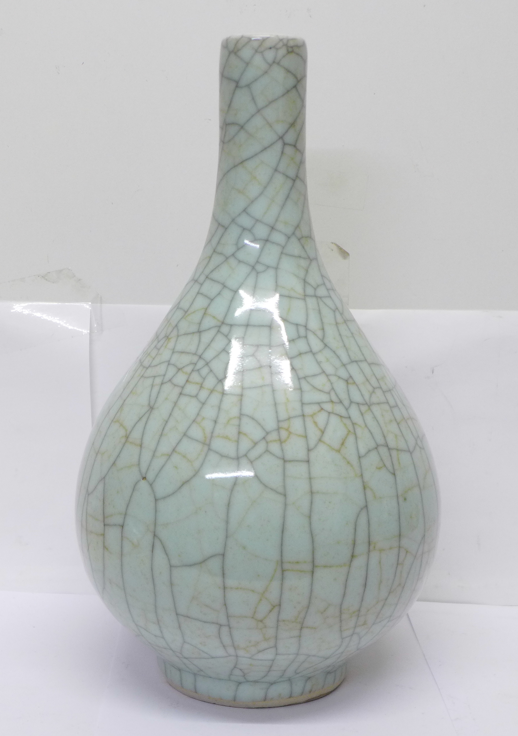 A large Chinese Guan ware celadon crackle glaze bottle vase, 38cm