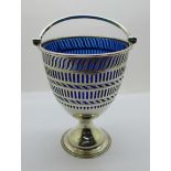 A Victorian pierced silver basket with blue glass liner, London 1894, West & Son, 277g, 144mm