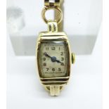 A 9ct gold cased lady's wristwatch with 9ct gold bracelet strap, weight without movement 8.8g