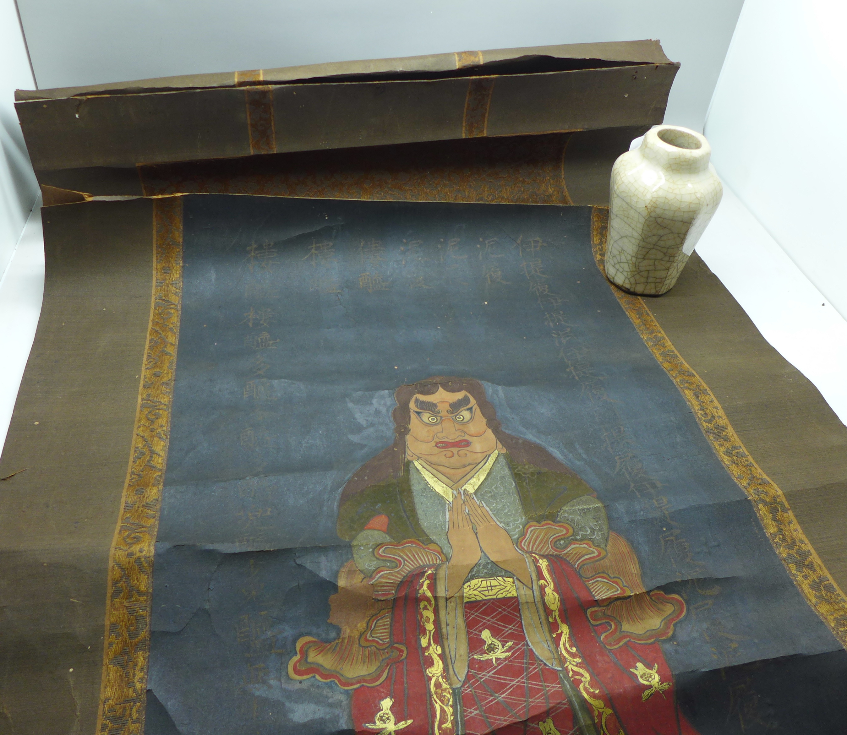 A Japanese scroll with a painted actor and calligraphy (94cm x 40cm) and a small crackle glaze vase,