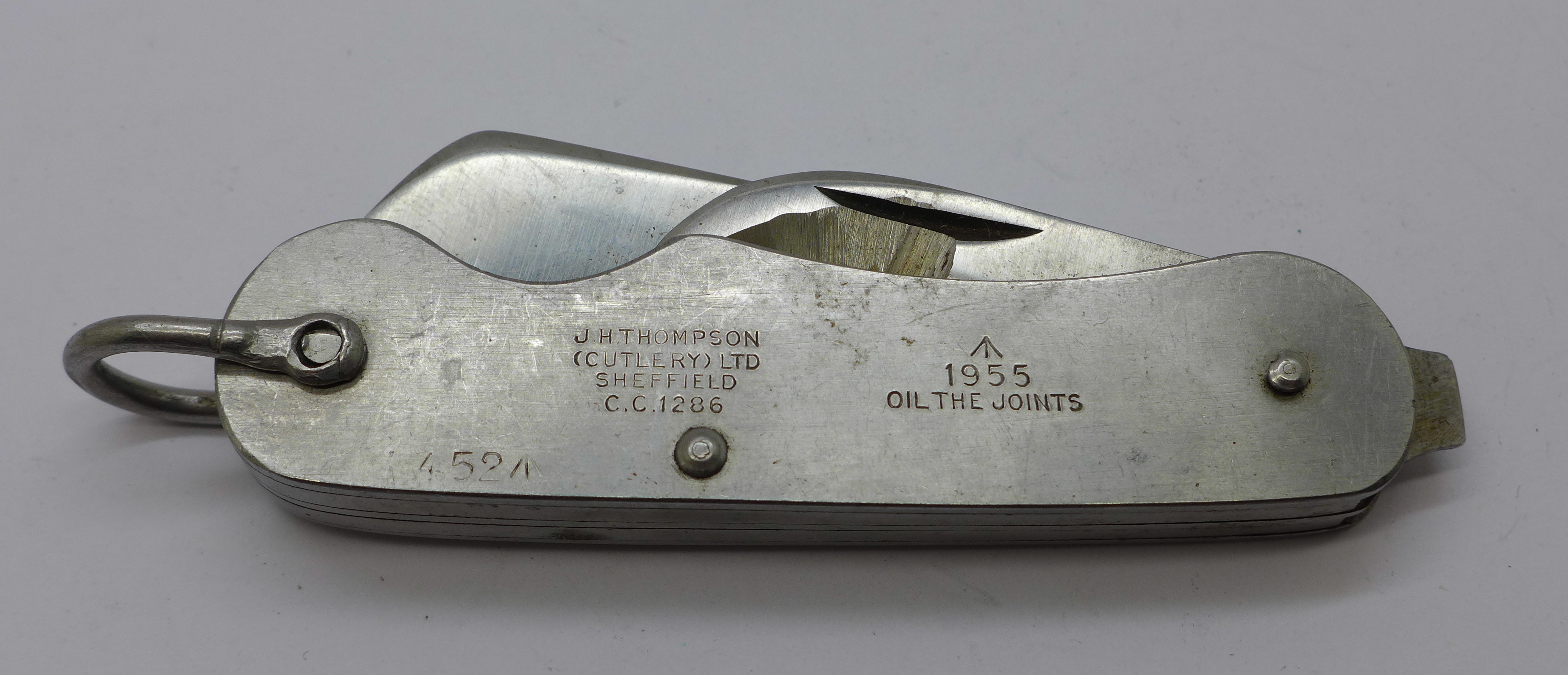 A military pocket knife, Thompson, Sheffield, marked 1955 and with broad arrow