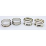 Two pairs of silver napkin rings, Francis and Webb, Birmingham 1945, 12g, and Henry Griffith and
