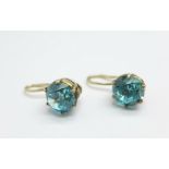 A pair of 1940's natural blue zircon earrings, set in yellow metal, stones approximately 1.1carats