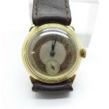 A 9ct gold cased wristwatch, the screw back case bears inscription dated 1945, 29mm case