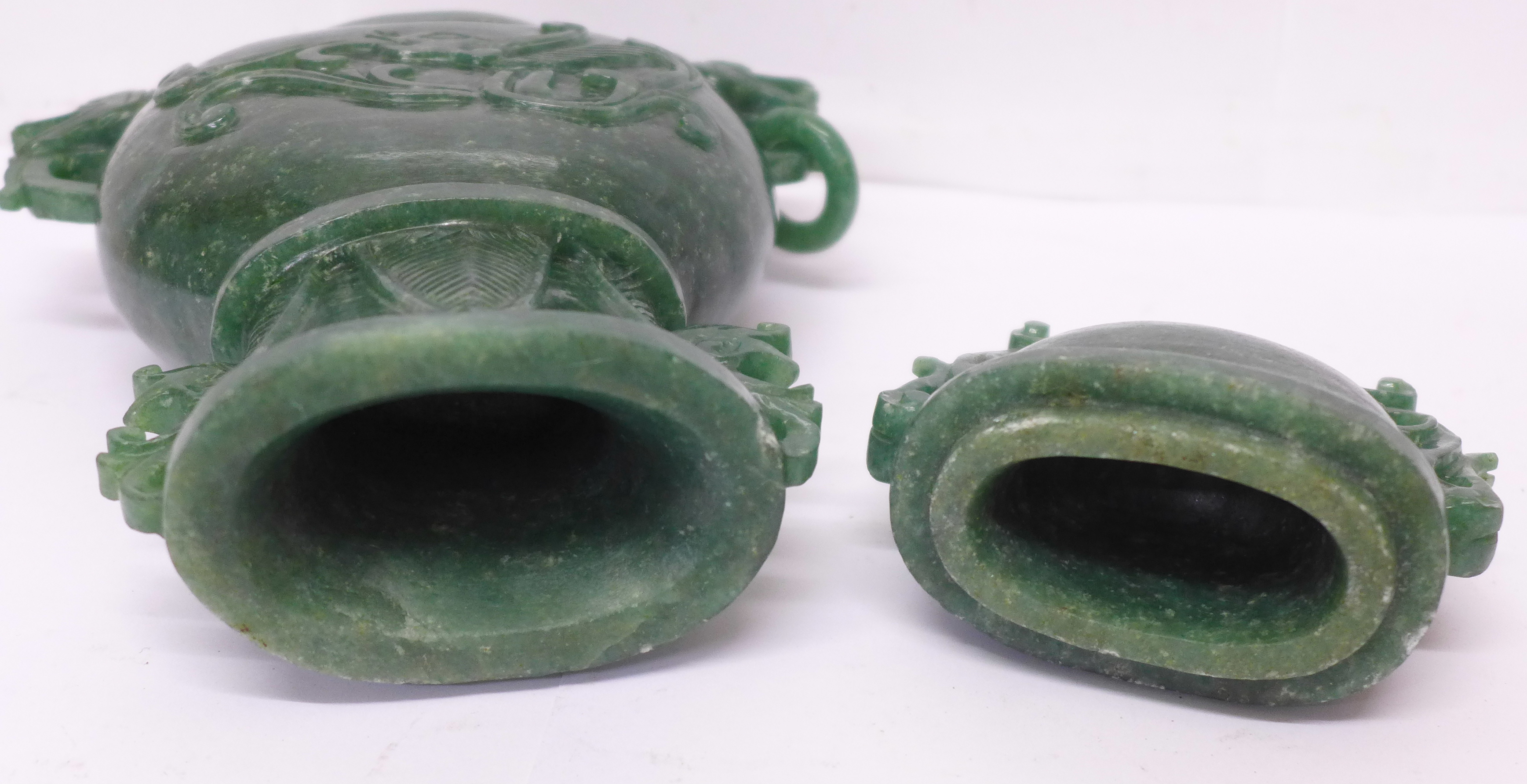 A carved green stone urn with lid, small losses to the lid and one ring missing, 23cm - Image 6 of 6
