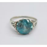 A white metal set Art Deco ring with natural blue zircon, approximately 4.1carats in weight, size L,