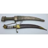 Two Eastern daggers with scabbards, one with mother of pearl handle