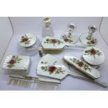 A silver and guilloche enamel dressing table set, includes a pair of dwarf candlesticks, cheroot