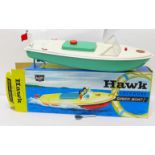 A Sutcliffe Model Hawk clockwork all metal Speed Boat, boxed