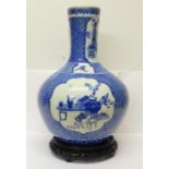 A Chinese blue and white bottle vase, six character mark to the base, a/f crack on the 'neck',