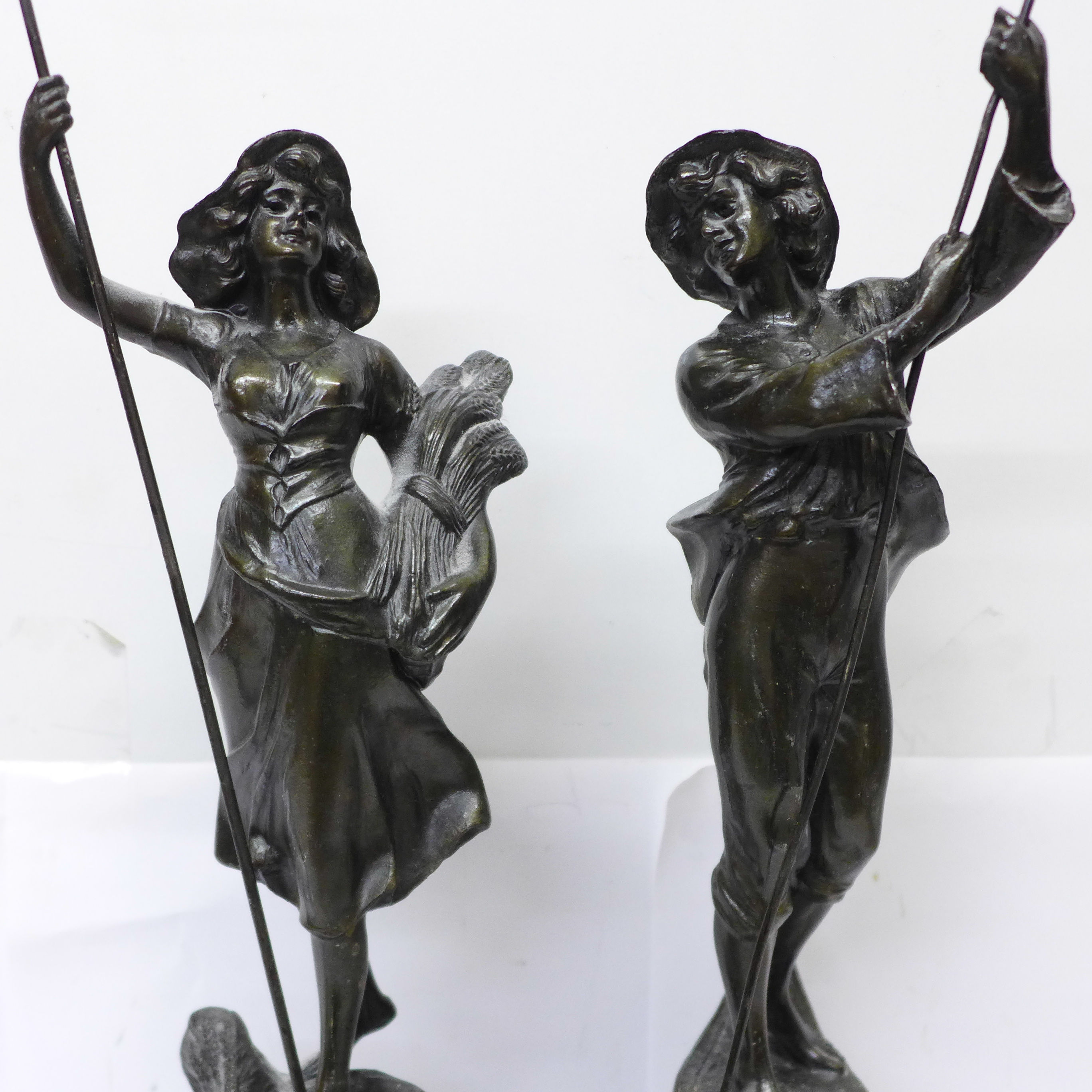 A pair of spelter figures, farm girl and boy, 39.5cm - Image 2 of 3