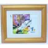 A framed photograph of six time World Snooker Champion Stephen Hendry, signed