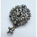 A 19th Century old cut diamond set pendant or brooch, set with over 100 diamonds, the centre stone