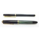 A Pelikan fountain pen with 14ct gold nib and an élysée fountain pen