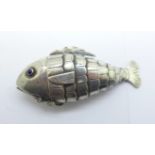 An antique silver articulated fish spice box, with blue cabochon eyes, possibly Georgian, 73mm,