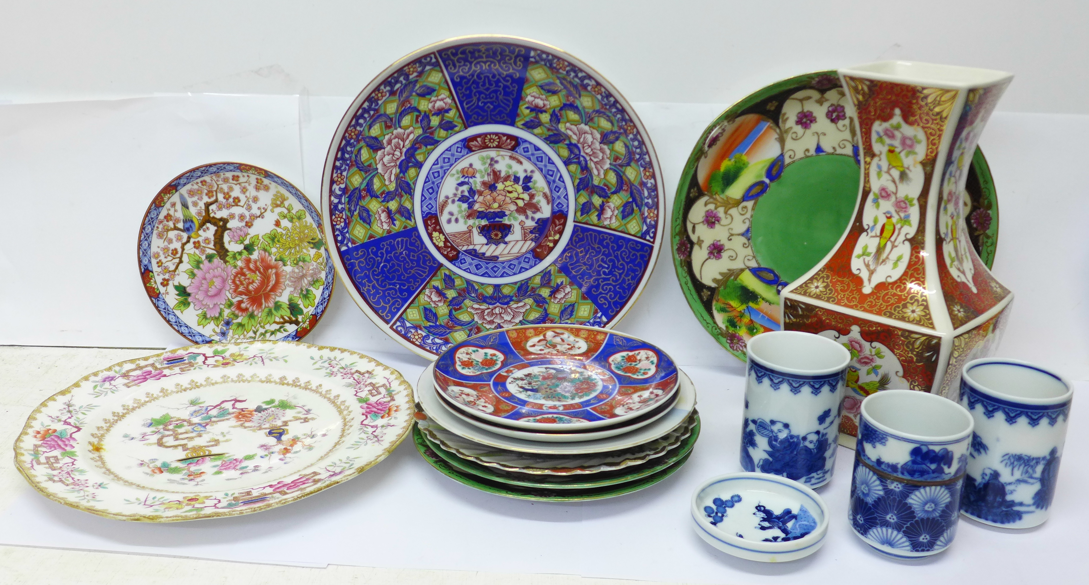 Oriental pottery including three blue and white pots and dish, (two signed on the base) and a