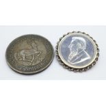 A South African 1947 five shillings and an 1892 two shillings set as a brooch