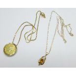 A 9ct gold chain, 3g, and a gold plated Queen Victoria pendant, and a yellow metal and citrine