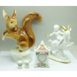 A Royal Dux model squirrel, a Gerold porcelain Bavarian figure of a goat, a Royal Albert clock,