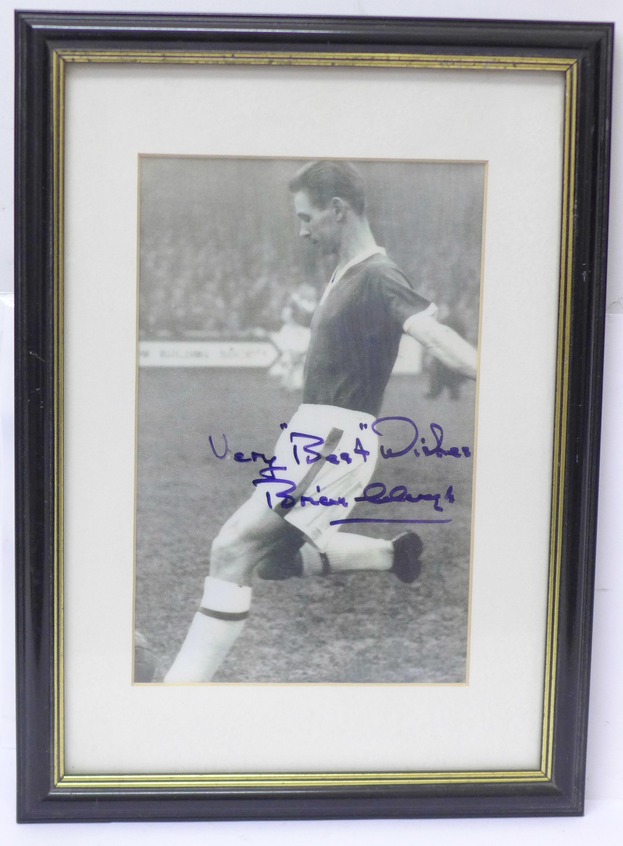 A framed photograph of Brian Clough playing for Middlesbrough, signed