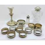 A Georgian silver salt, a set of six silver napkin rings, three other silver napkin rings, a