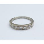 An 18ct white gold, seven stone diamond ring, 4.2g, O