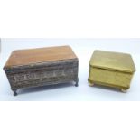 A white metal box with olive wood top and a gilt metal velvet lined box with crest of arms on the