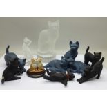A collection of nine cat figures including Nachtmann, Sherratt & Simpson and Border Fine Arts