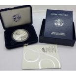 A 2006 American Eagle one ounce .999 silver proof $1 coin, West Point mint, with box and certificate