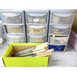 Two sets of plastic drawers with mixed cutlery and a collection of knives and knife sharpeners**