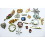 Fifteen brooches, two pill boxes, a pair of earrings and a pendant