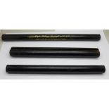 An ebony rolling ruler and two ebonised rolling rulers, one with firm's advertising, 'Hoyle, Robson,